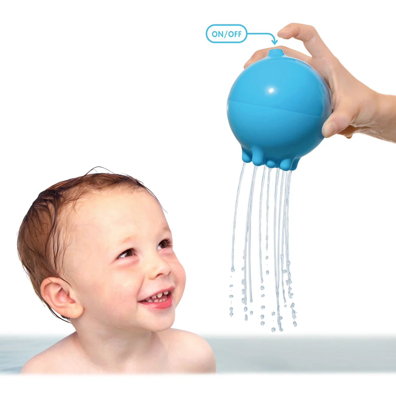 MOLUK Pluï Rainball · Classic colour assortment — A child watching the Rainball water-flow effect during supervised play.